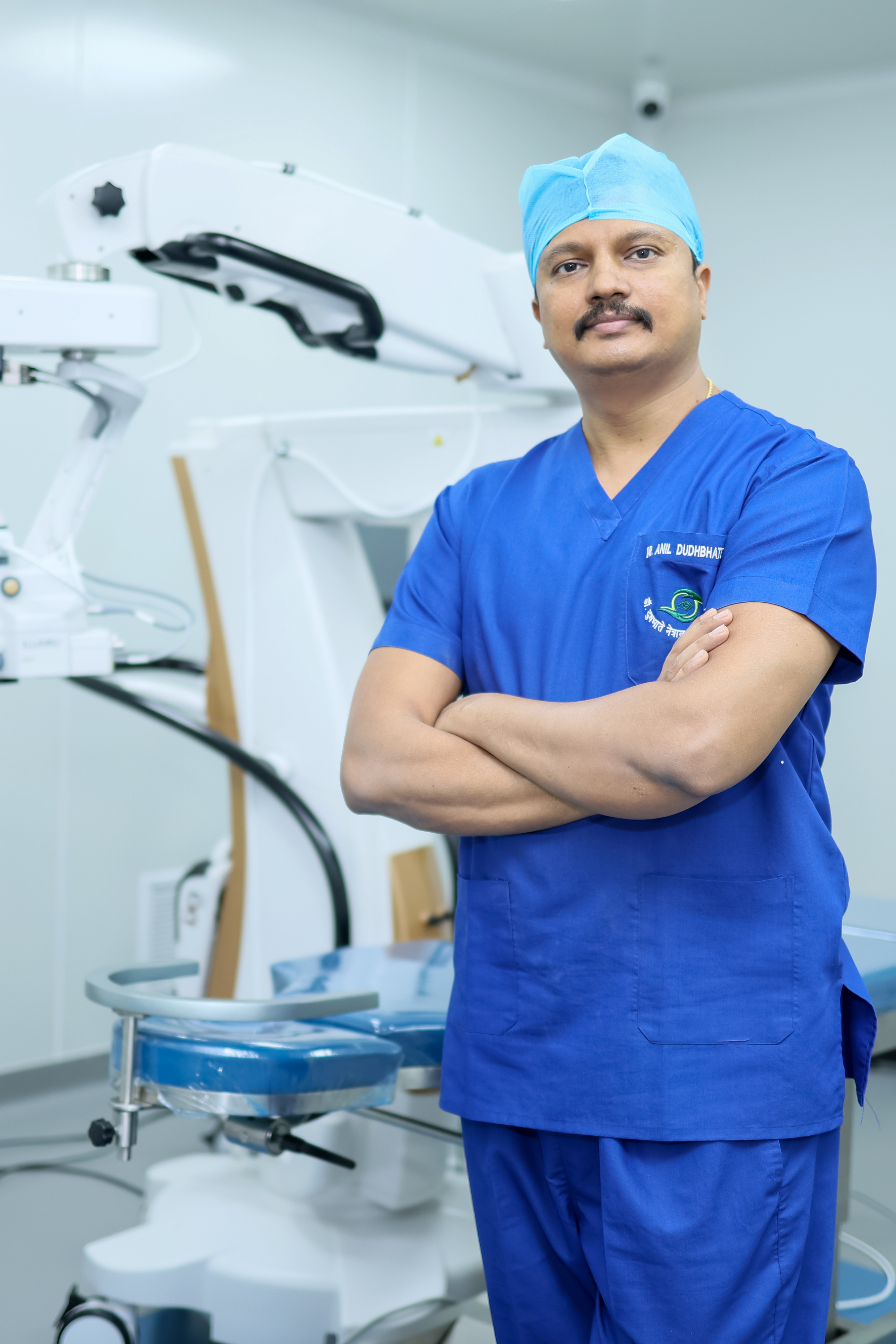 Doctor Anil Dudhbhate examining patient's eye before surgery at Dr.DudhbhateNetralay and Retina Centre, the best Eye Clinic Near Me